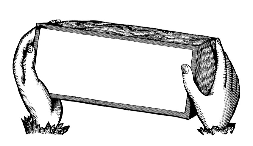 Engraved hands holding a carved block